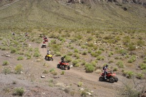 people on 4-wheelers