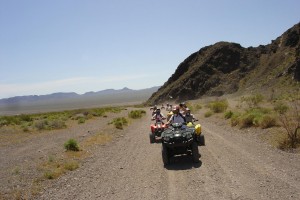 people on 4-wheelers