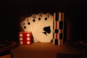 giant dice, playing cards and poker chips