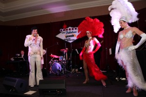 elvis impersonator with showgirls