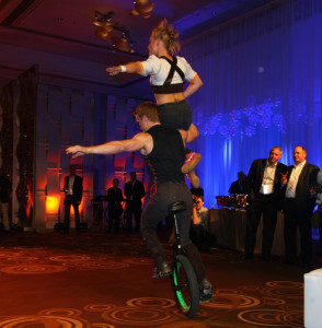 people riding unicycle