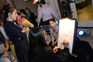 woman drawing caricature