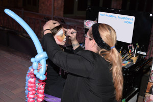 girl getting face painted