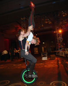 people riding unicycle